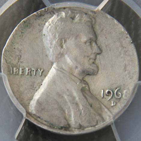1968-D penny struck on silver dime planchet compared to normal copper penny, showing size and color difference